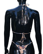 Black mannequin showcasing the back ties of the Kalina bikini against a white background