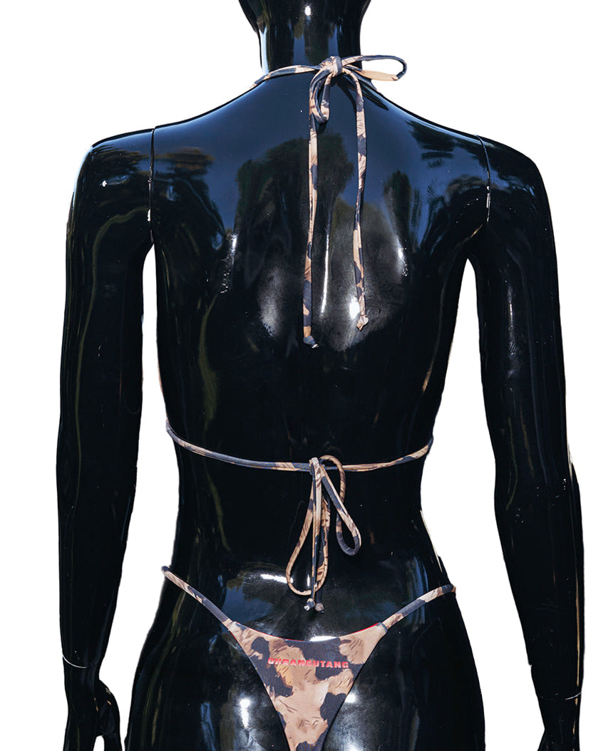 Black mannequin showcasing the back ties of the Kalina bikini against a white background