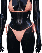A front view of a mannequin wearing a vivid peach bottom bikini, with the straps and the material visible.